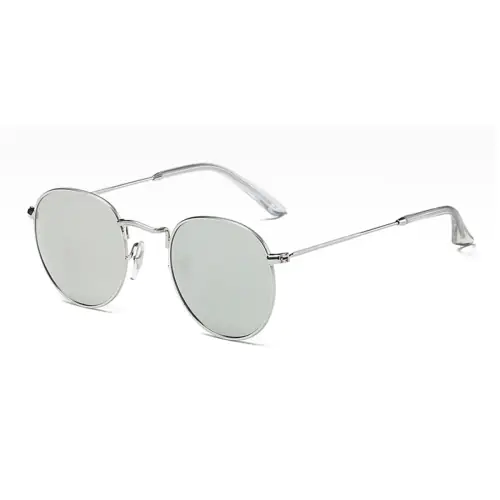 Round glasses with silver metal frame accommodate prescription
